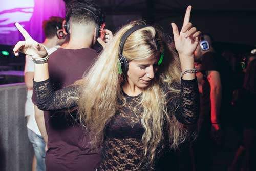 Outdoor silent party on headphones