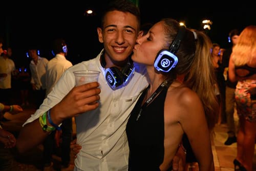 Silent disco party with light-up headphones
