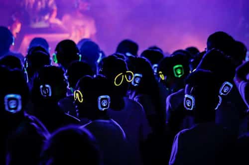 Silent disco party with light-up headphones